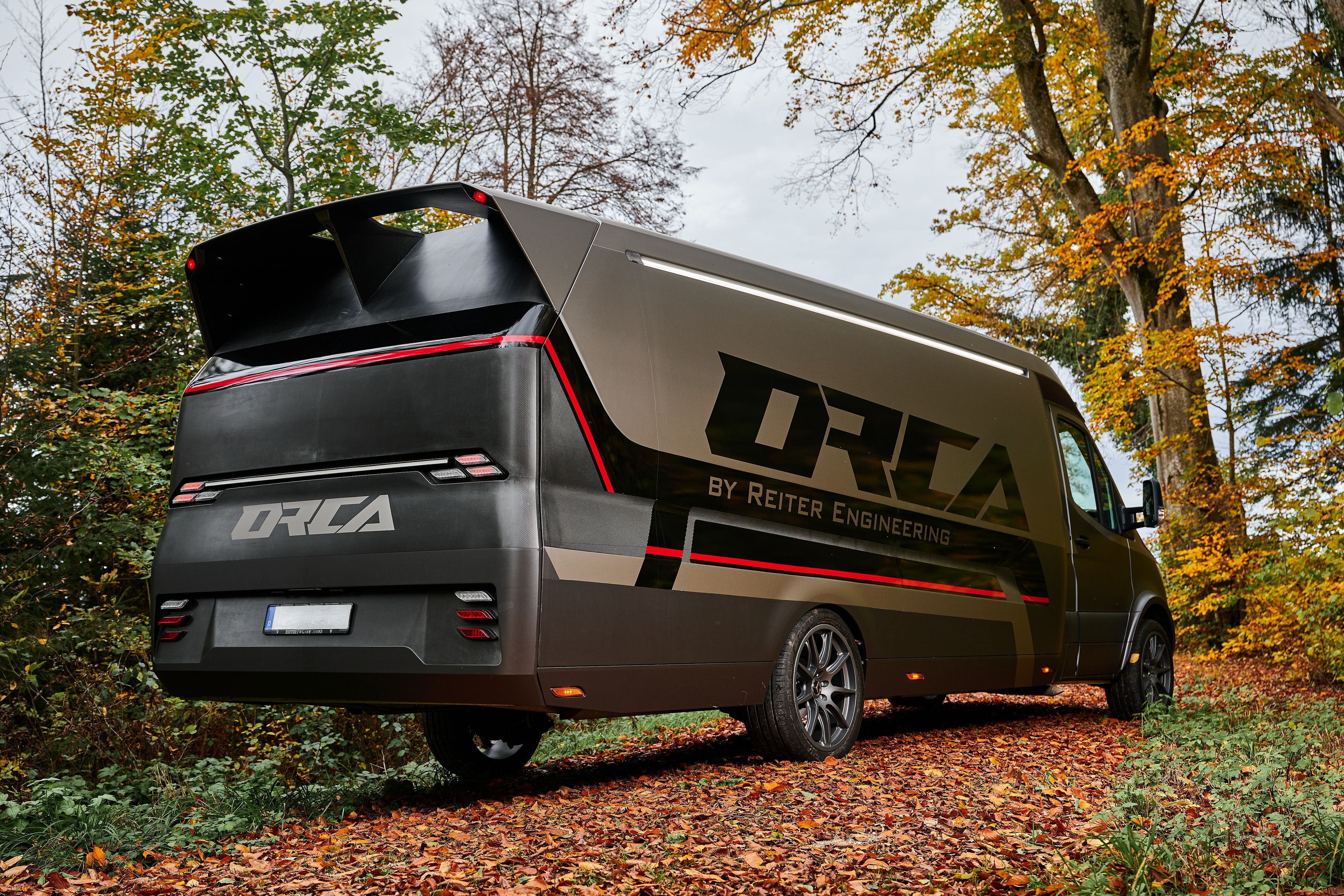 orca transporter rear view forest