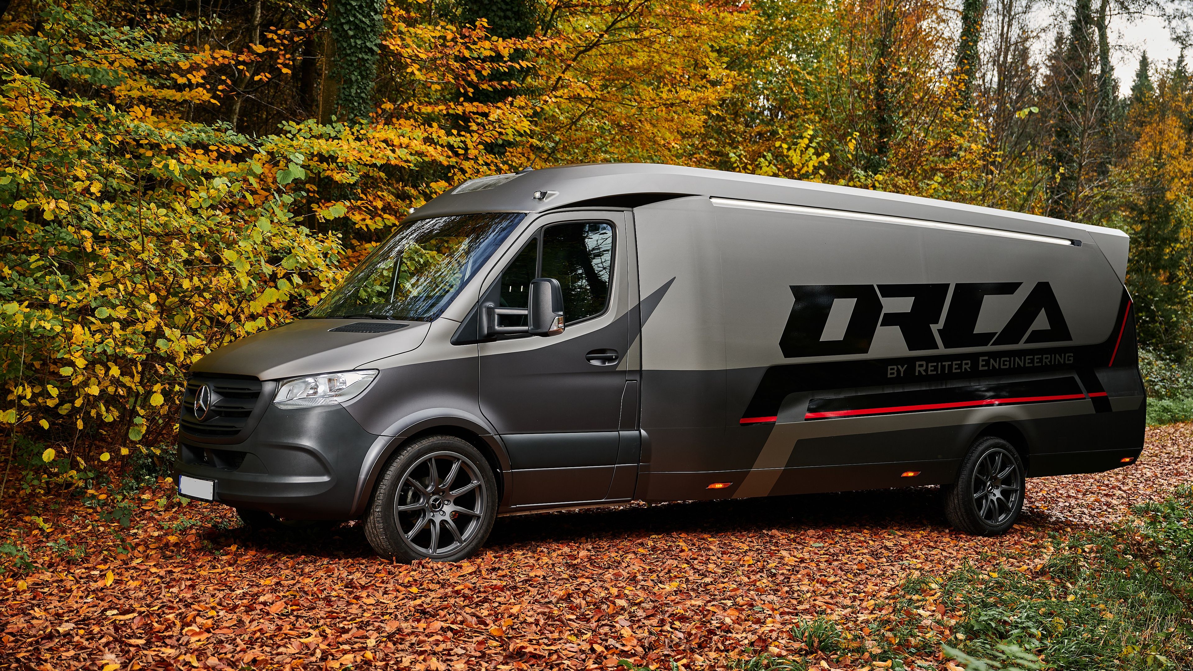 orca transporter front view forest